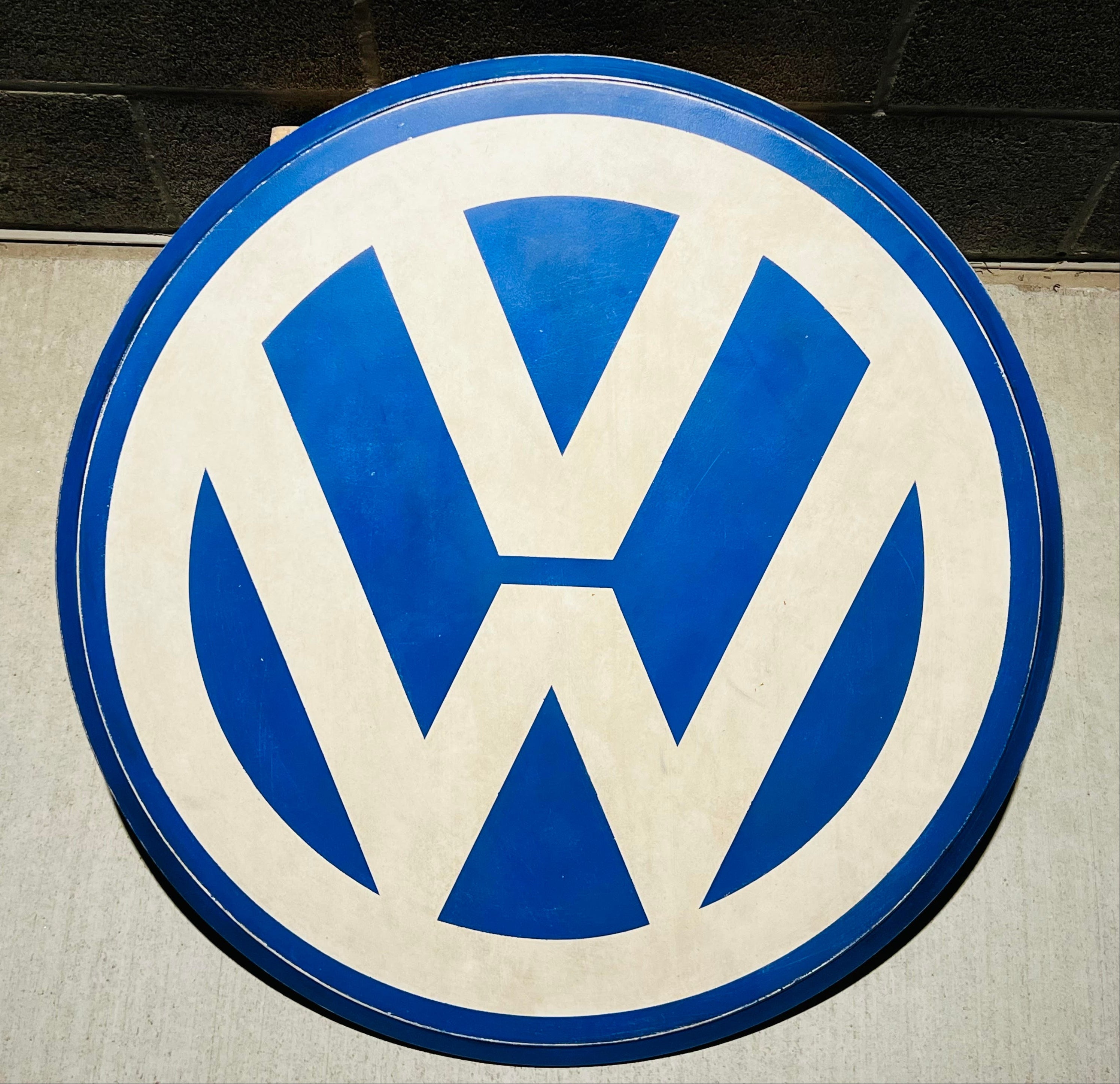 Volkswagen logo on vintage wood sign